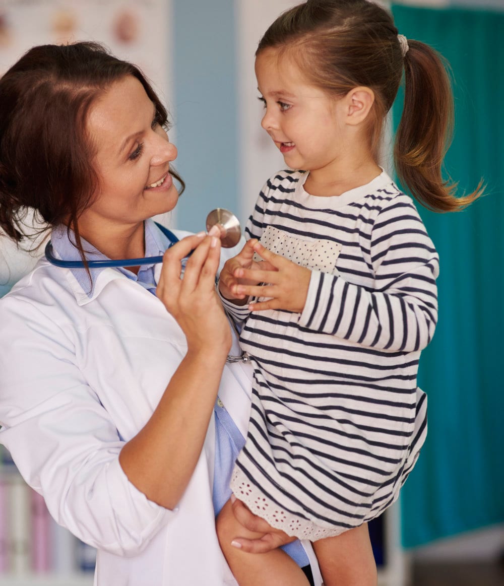 Illustrative concept of a family doctor with a young patient holding a stethoscope